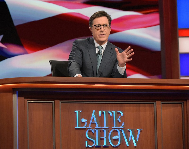 
              In this July 27, 2016 photo released by CBS, Stephen Colbert, host of "The Late Show with Stephen Colbert," appears during a broadcast in New York. Lawyers representing his old show company complained to CBS after Colbert revived the character he played under his own name on “The Colbert Report,"  a clueless, full-of-himself cable news host.  (Scott Kowalchyk/CBS via AP)
            