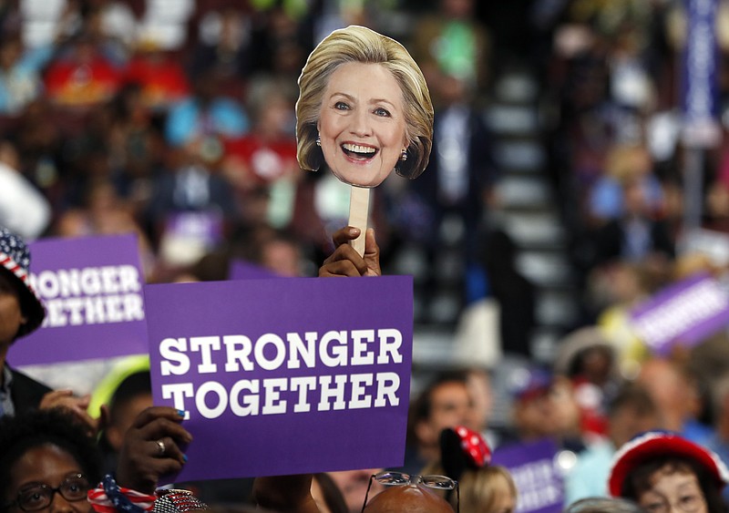Delegates hold up signs to show their support for Democratic presidential candidate Hillary Clinton during the Democratic National Convention in Philadelphia.