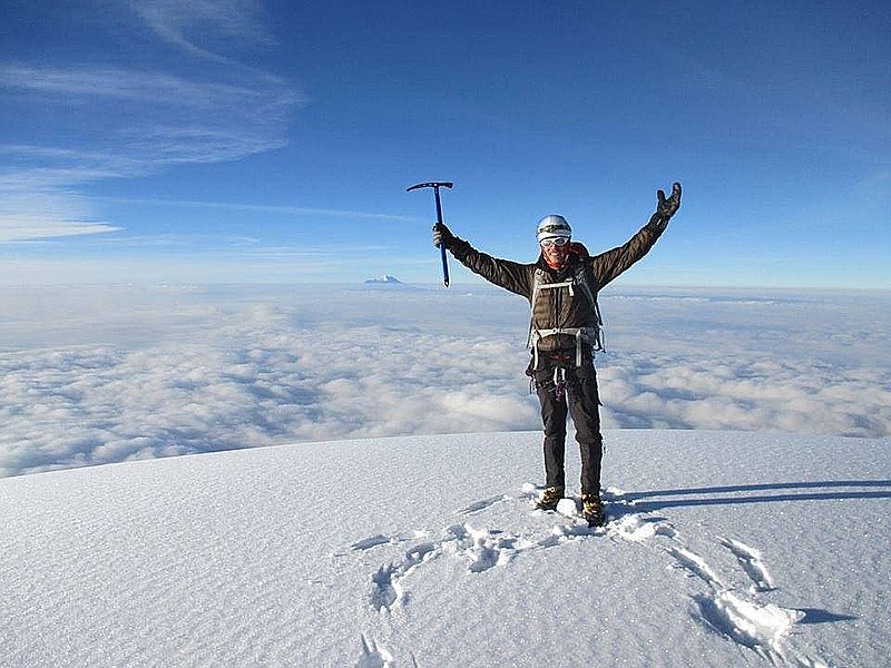 Mac Waddell stands atop Cotopaxi, the second-highest summit in Ecuador. (Contributed Photo)