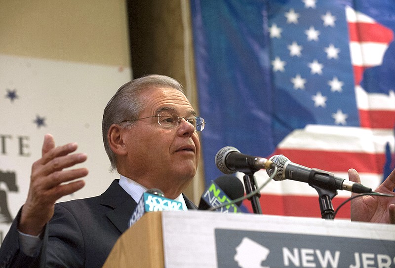 
              U.S. Sen. Bob Menendez, D-N.J., speaks to New Jersey's Democratic delegates to the Democratic National Convention during a Thursday, July 28, 2016, breakfast at the Renaissance Philadelphia Airport Hotel in Philadelphia. Menendez said that Republican presidential nominee Donald Trump's comments about Russia exposing Democratic presidential candidate Hillary Clinton's emails are an "act of treason." (Jose F. Moreno/Camden Courier-Post via AP)
            