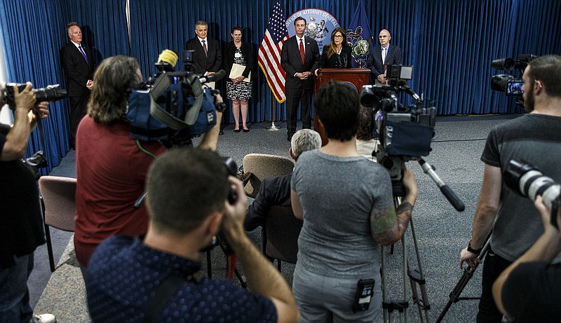 
              Attorney General Kathleen Kane announces the agreement her office has reached with the Hershey Trust Company and the Milton Hershey School that implements significant reforms to improve the operation and governance of both entities, Friday, July 29, 2016, in Harrisburg, Pa. (Dan Gleiter/PennLive.com via AP)
            