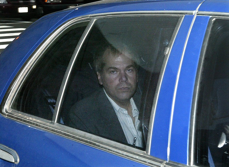 
              FILE - In this Nov. 18, 2003 file photo, John Hinckley Jr. arrives at U.S. District Court in Washington. A judge says Hinckley, who attempted to assassinate President Ronald Reagan will be allowed to leave a Washington mental hospital and live full-time in Virginia.  (AP Photo/Evan Vucci, File)
            