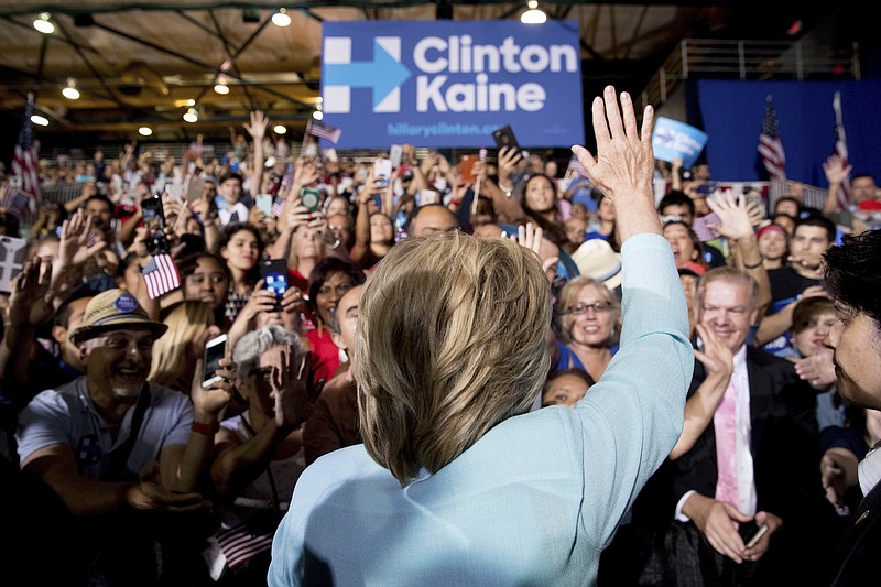 Democratic presidential candidate Hillary Clinton waves to members of the audience after speaking at a recent rally at Florida International University.