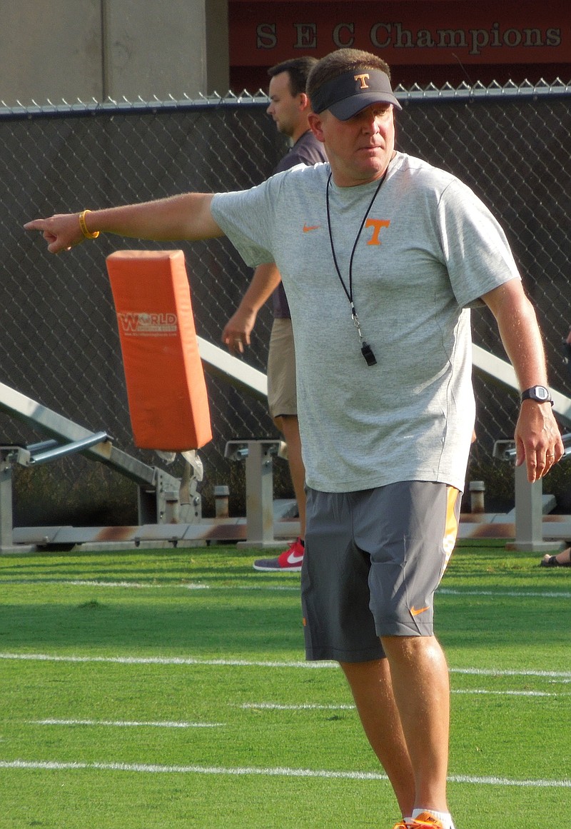 Defensive coordinator Bob Shoop signals instruction during Tennessee's practice at Haslam Field on Aug. 1, 2016.