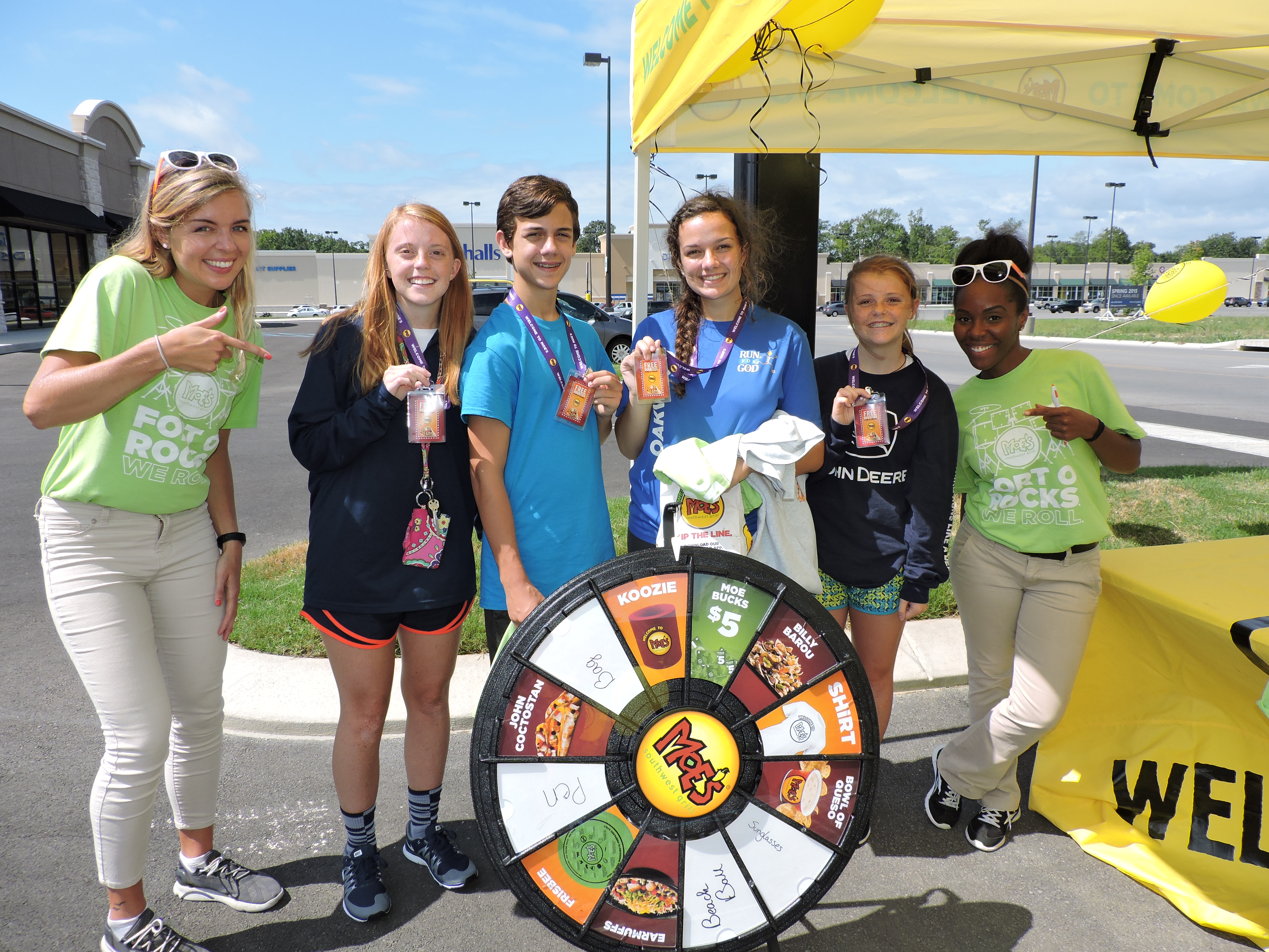 Youth receive free burritos for a year at Moe's Southwest Grill in Fort Oglethorpe after camping out all night in the parking lot to be among the first 50 people in line on opening day. From left are Moe's Southwest Grill brand ambassador Samantha Crawford, Gordon Lee High School senior Molly Thomison, 18, Gordon Lee Middle School eighth-grader Jake Lee, 14, his sister, GLHS senior Hannah Lee, 17, GLHS freshman Sally Thomison, 15, and Moe's Southwest Grill brand ambassador Meredith Seay.