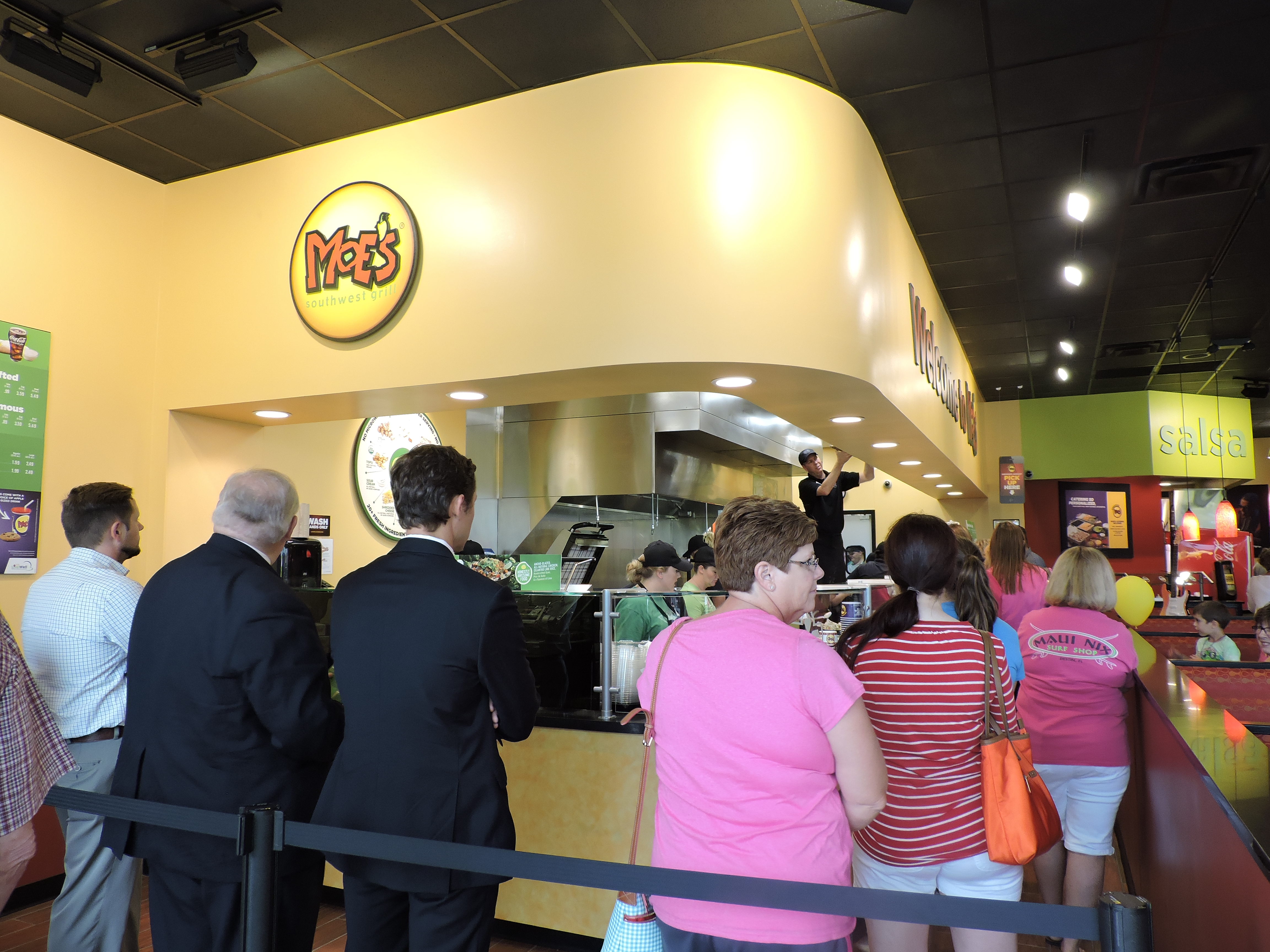 Patrons wait in line at Moe's Southwest Grill in Fort Oglethorpe on opening day.