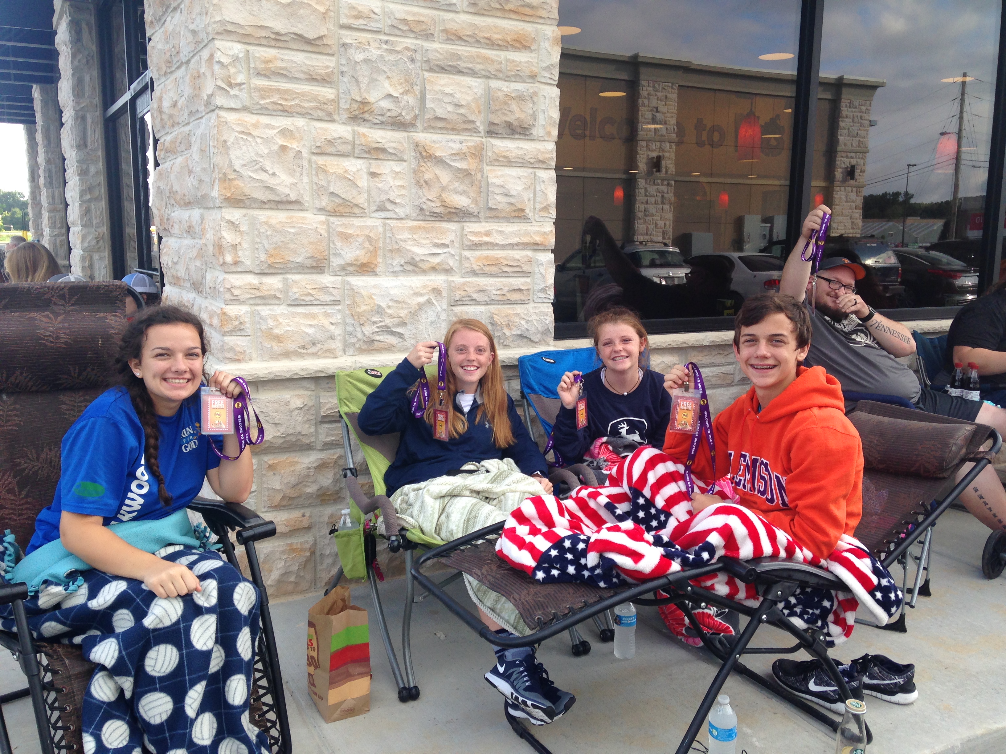 Youth from Chickamauga camp outside the new Moe's Southwest Grill in the hopes of receiving free burritos for a year. Clockwise from left are Gordon Lee High School senior Hannah Lee, 17, senior Molly Thomison, 18, freshman Sally Thomison, 15, and Gordon Lee Middle School eighth-grader Jake Lee, 14.