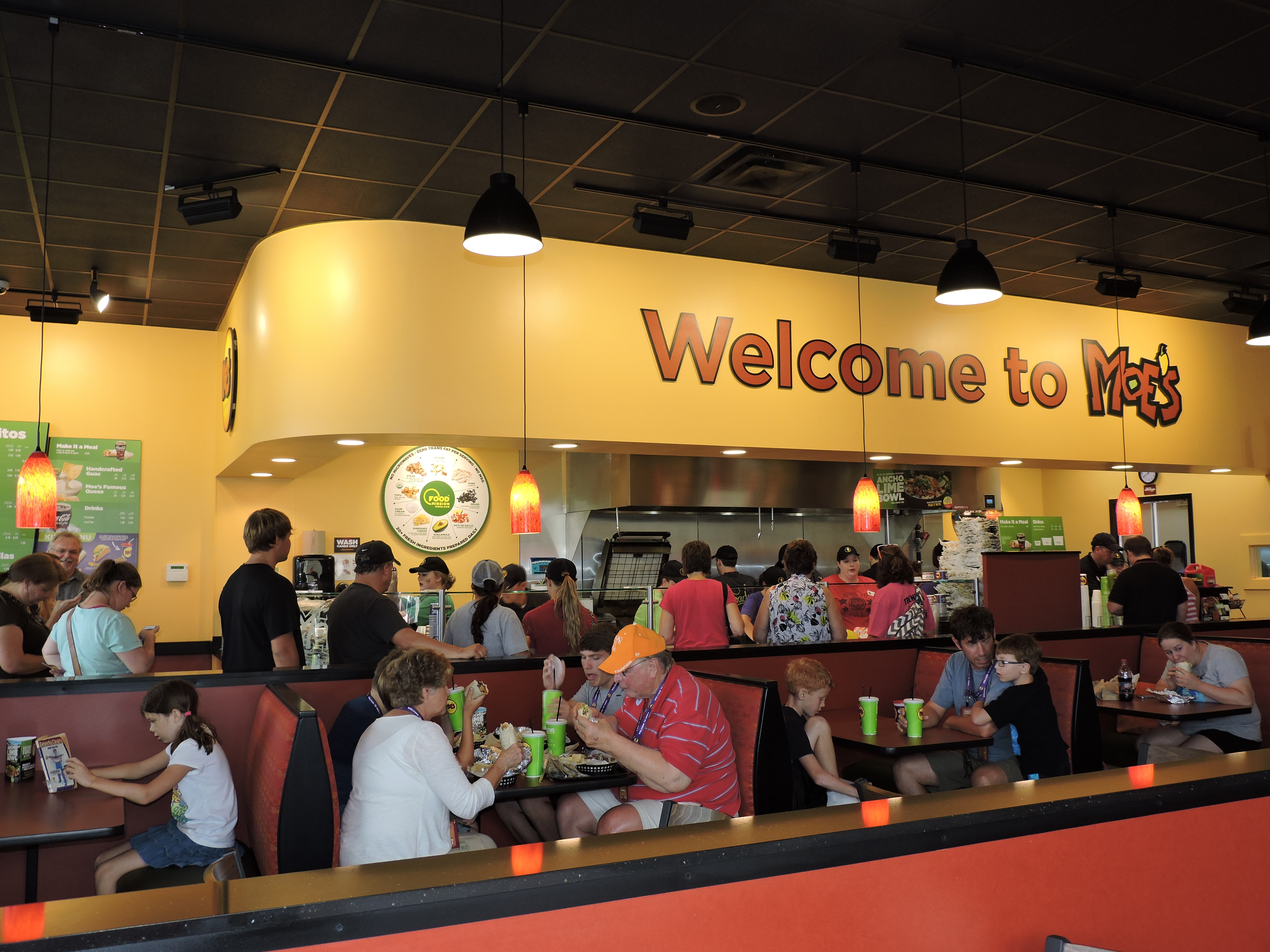 The line stays steady with a stream of people coming into Moe's Southwest Grill in Fort Oglethorpe on opening day.