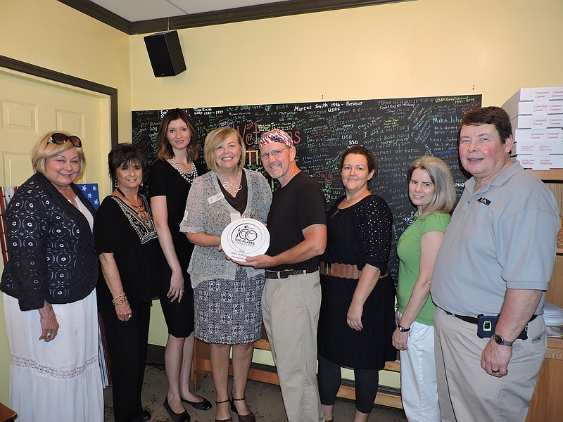 From left are Walker County Commissioner Bebe Heiskell, Walker County Chamber of Commerce Director of Programs and Events Glenda Jones, Chamber President Lacey Wilson, Georgia Department of Economic Development Tourism Project Manager Janet Cochran, Bob's Brick Oven owner Bob Watts, city of Chickamauga Tourism Director Fanci Moore, Walker County Chamber of Commerce Ambassador Shanda Reese Morton and Chamber Chairman/ShopRite President PR Cook.