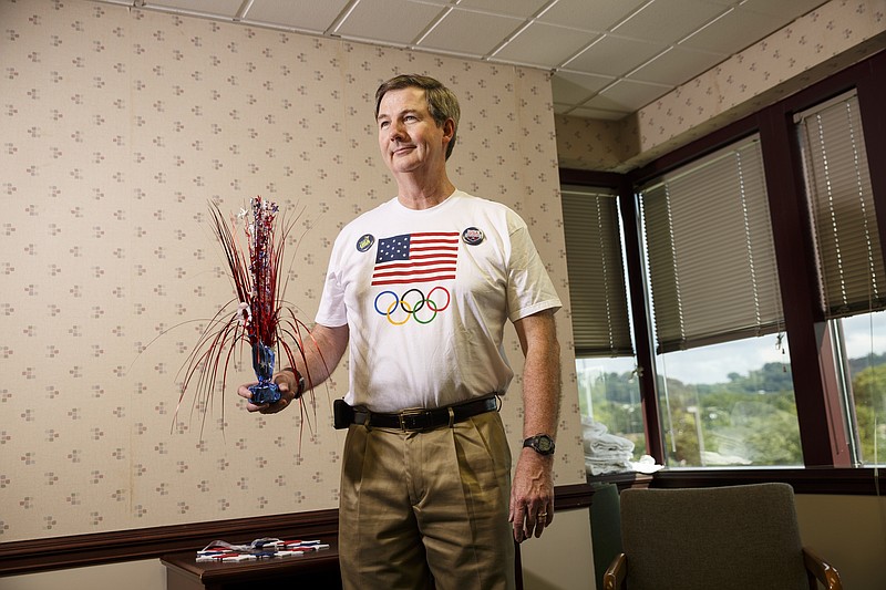 Dr. Eugene Ryan, whose son Sean Ryan will be competing in the open water swimming event at the Rio Olympics, is photographed in his offices Friday, July 29, 2016, in Chattanooga, Tenn.