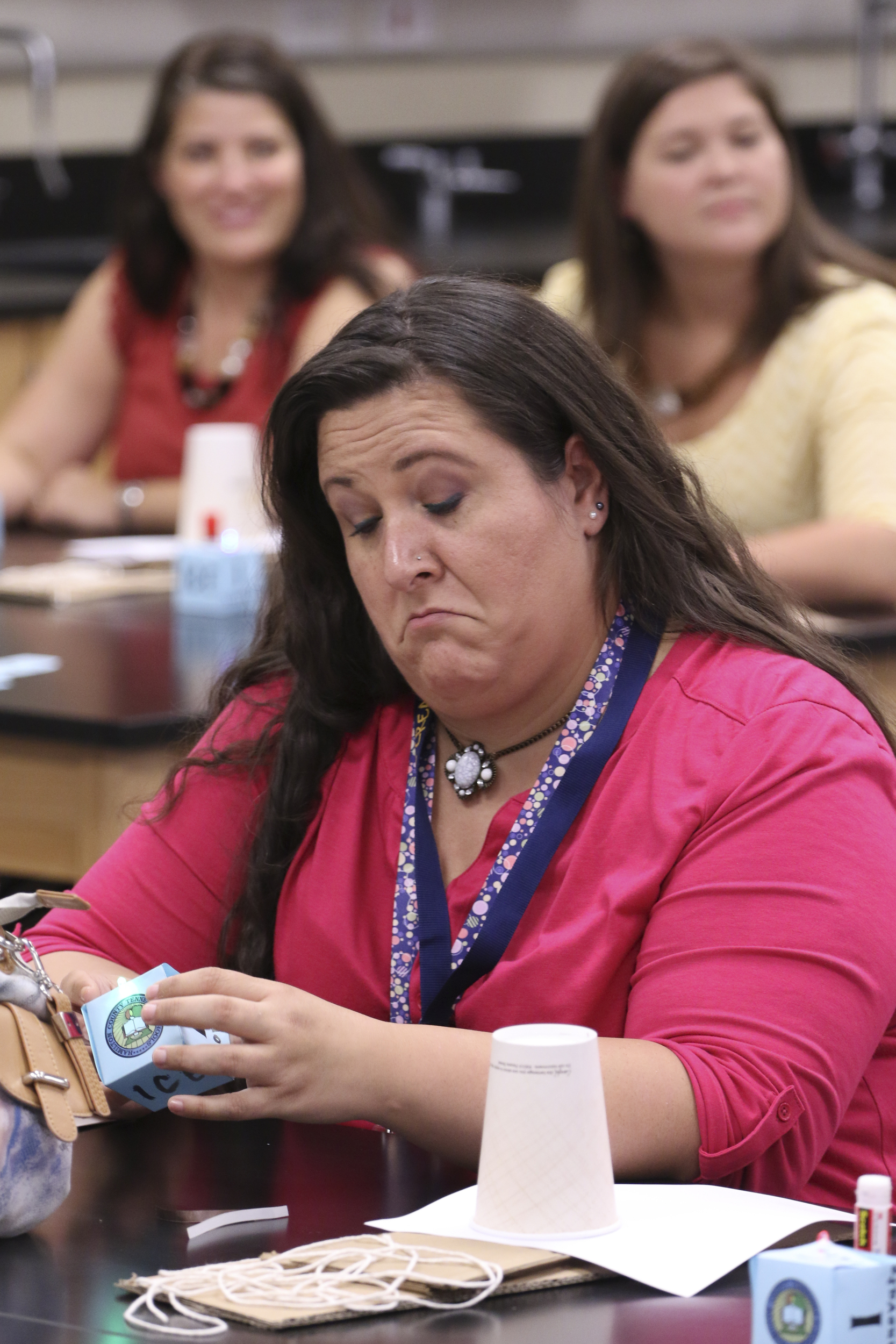Staff Photo by Dan Henry / The Chattanooga Times Free Press- 8/1/16. Trinity Owens, an educator at Calvin Donaldson, builds a box during the I.C.E. Institute (Innovate Create Engage) held at Red Bank Middle School on Monday, August 1, 2016.