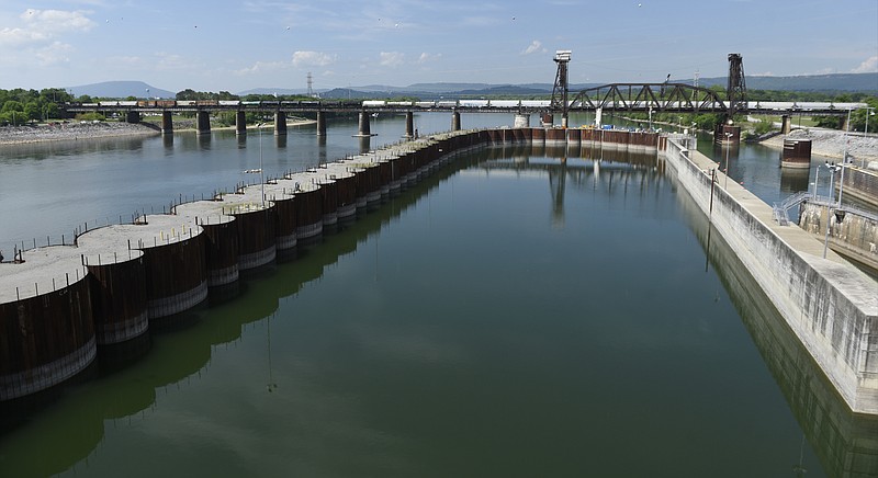 In this Apr. 25, 2016, staff file photo, a cofferdam surrounds the stalled project to build a new lock at the Chickamauga Dam in Chattanooga.