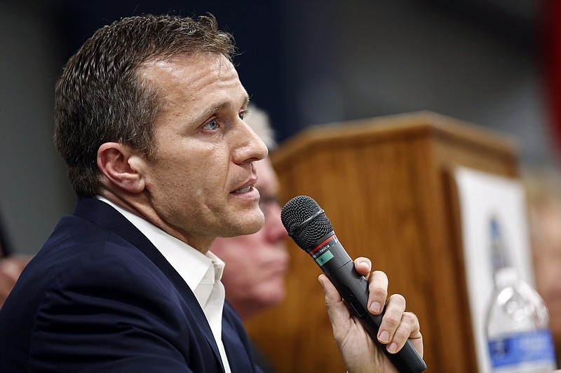 
              FILE - In this Nov. 3, 2015, file photo, Missouri Republican gubernatorial candidate, former Navy SEAL Eric Greitens, speaks during a forum in Jefferson City, Mo. Greitens is one of four Republicans running in the Aug. 2 primary to become the party's nominee for Missouri governor. (AP Photo/Jeff Roberson)
            