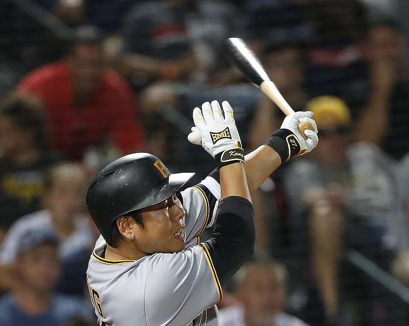 Pittsburgh Pirates third baseman Jung Ho Kang drives in a run with a base hit in the sixth inning for a baseball game against the Atlanta Braves, Tuesday, Aug. 2, 2016, in Atlanta.