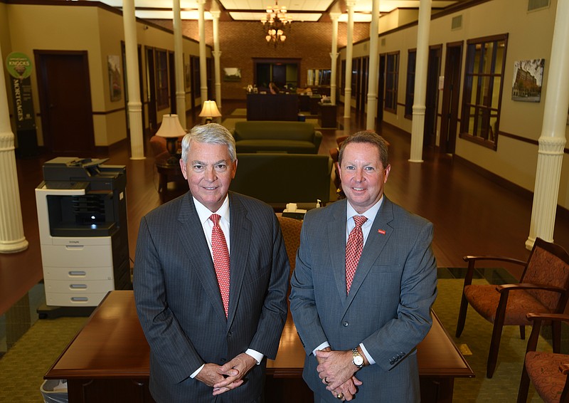 CEO of Synovus Corp Kessel Stelling, left, and president and CEO of Cohutta Banking Company Mike Sarvis stand Wednesday, August 3, 2016 in Cohutta Bank on Market Street.
