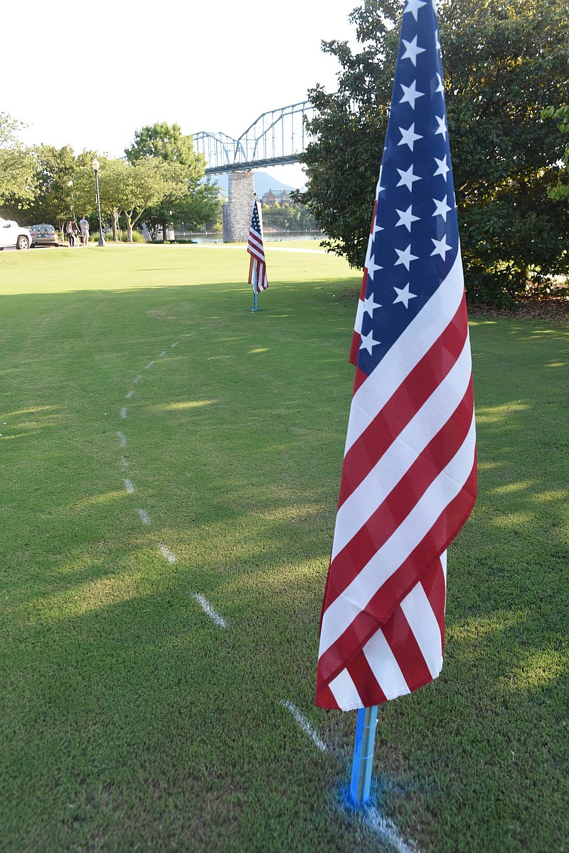 American flags and a dotted white line denotes the area where the Charles H. Coolidge Medal of Honor Heritage Center would be located in Coolidge Park.