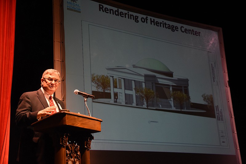 Retired Maj. Gen. Bill Raines, chairman of the Charles H. Coolidge Medal of Honor Heritage Center, speaks to an overflow crowd  Wednesday night at the Chattanooga Theatre Center auditorium.