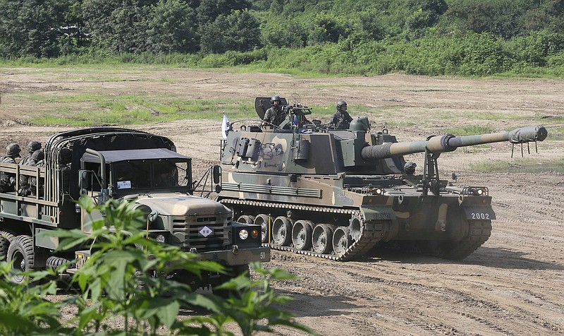 
              South Korea's army K-9 self-propelled artillery vehicle moves during an exercise in Paju, South Korea, near the border with North Korea, Thursday, Aug. 4, 2016. A medium-range ballistic missile fired Wednesday by North Korea flew about 1,000 kilometers (620 miles) and landed near Japan's territorial waters, Seoul and Tokyo officials said, one of the longest flights by a North Korean missile. (AP Photo/Ahn Young-joon)
            