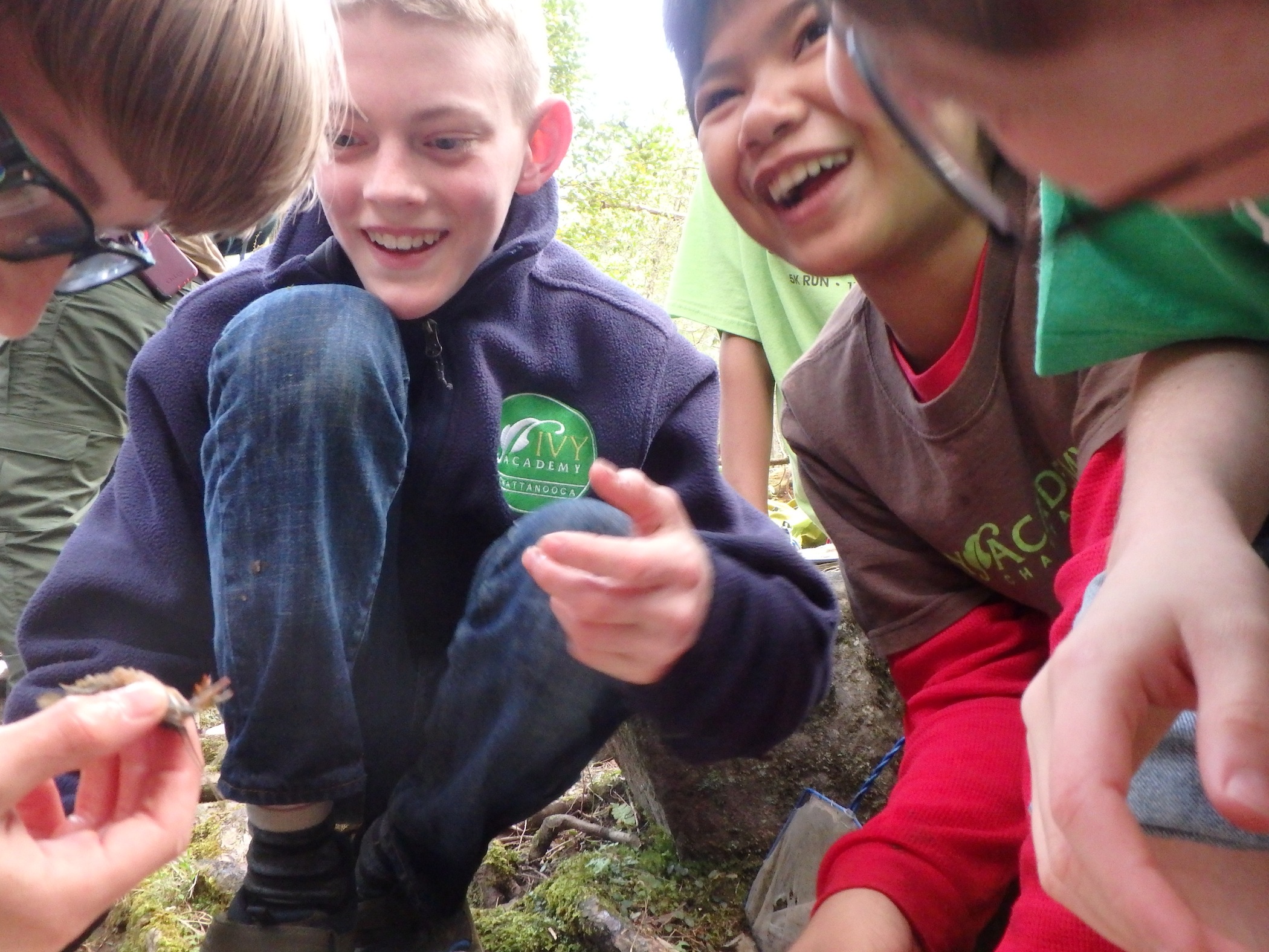 Ivy Academy middle schoolers, Collin Milner, Clay Couch, Kai Som and Ethan Burns, from left, enjoy hands-on, inquiry-based field studies.