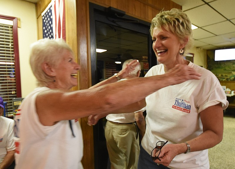Rhonda Thurman receives a hug from her mother, Thelma Potter inside Wimpie's Restaurant in Soddy-Daisy after defeating Dr. Patti Skates in the District 1 school board race.