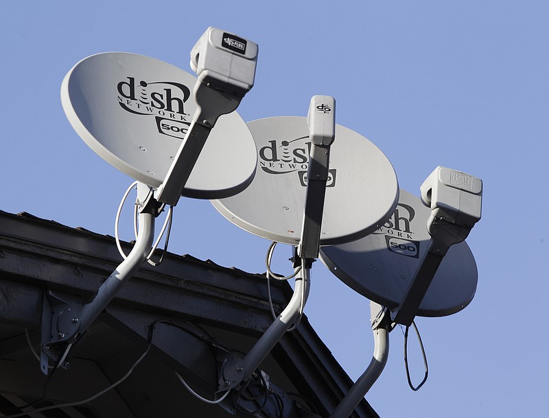 
              FILE - This Feb. 23, 2011 file photo shows three Dish Network satellite dishes at an apartment complex in Palo Alto, Calif. Dish Network is offering a new “skinny” bundle of about 50 cable channels that doesn’t include ESPN and some other sports channels, giving people who don’t care about sports a way to save money on TV without joining the ranks of “cord cutters.” (AP Photo/Paul Sakuma, File)
            