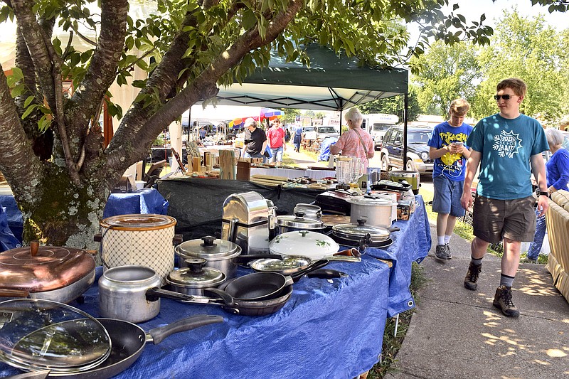 Yard sale items line Rankin Avenue in Dunlap. The World's Longest Yard Sale kicked off Thursday, Aug. 4, 2016, along Highway 127 in Dunlap, Tenn. The sales runs until Sunday and goes from Gadsden, Ala., to Addison, Mich.