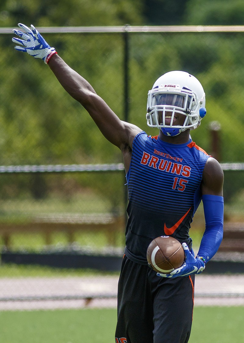 Northwest Whitfield receiver Jay Jones waves after catching a pass at the Southeastern 7 on 7 Championships on Friday, July 15, 2016, in Dalton, Ga.