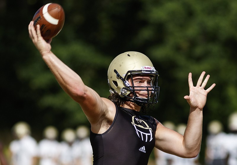 Calhoun quarterback Baylon Spector takes part in a 7-on-7 camp this summer. The Yellow Jackets haven't lost a region game since 2001, and they'll try to win their 16th region title in a row this fall.