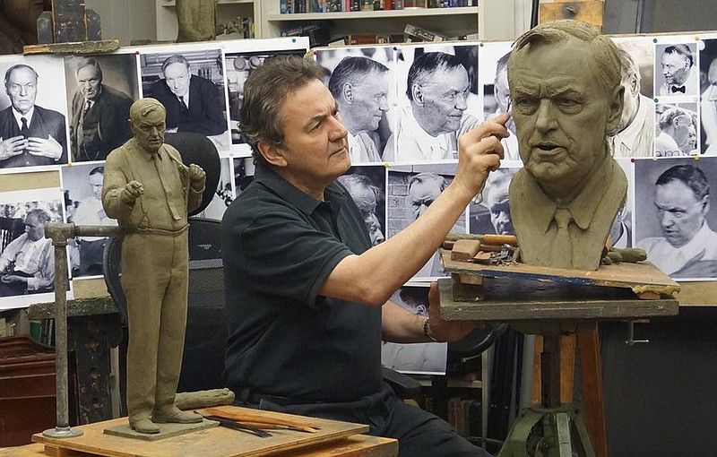 
              In this July 2016 photo, sculptor Zenos Frudakis works on a statue of attorney Clarence Darrow in his studio in Glenside, Penn. The statue is to be placed near a statue of William Jennings Bryan outside the Rhea County Courthouse in Dayton, Tenn., where the two men faced off in the 1925 Scopes "monkey trial." (Rosalie Frudakis via AP)
            
