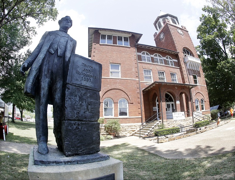 In this July 23, 2016, photo, a statue of orator William Jennings Bryan stands out side the Rhea County Courthouse in Dayton, Tenn. An atheist group is raising money to place a statue of attorney Clarence Darrow opposite the statue of Bryan outside the courthouse where the two faced off in the 1925 Scopes "monkey trial." It's an event one Dayton leader deemed unlikely when the Bryan statue was erected in the southeast Tennessee town in 2005.