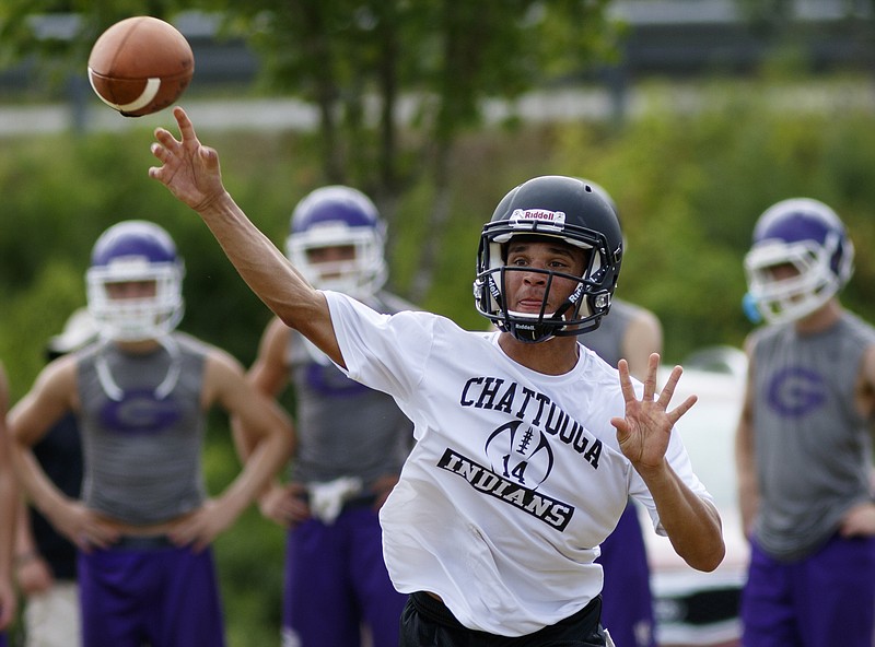 Chattooga High School quarterback Isaac Foster passes during 7-on-7 action this summer. 