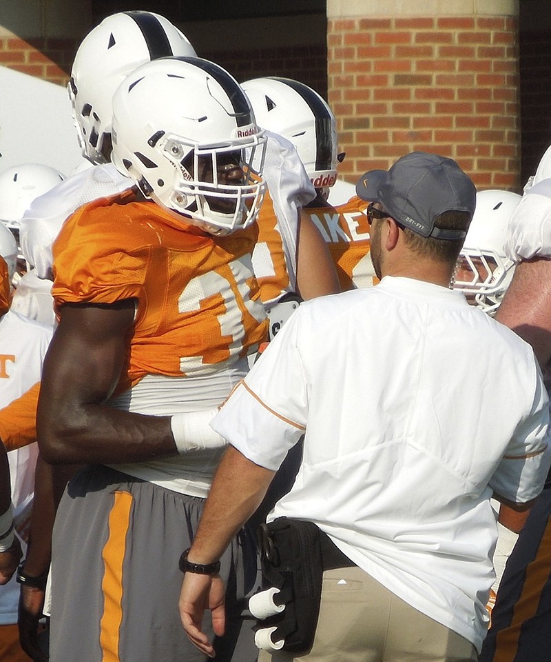 Tennessee freshman Daniel Bituli, left, was a consensus four-star recruit who adds to the depth the Vols believe they have at linebacker this season.