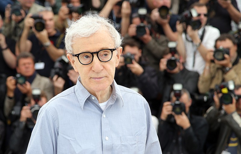 
              FILE - In this Wednesday, May 11, 2016, file photo, director Woody Allen poses for photographers during a photo call for the film Cafe Society, at the 69th international film festival, Cannes, southern France. Allen’s first small-screen series, “Crisis in Sex Scenes,” will debut Sept. 30, 2016. The comedy, set during the upheaval of the 1960s, focuses on a suburban family dealing with the chaos brought by a visitor. The cast includes Allen, Miley Cyrus and Elaine May. (AP Photo/Thibault Camus, File)
            