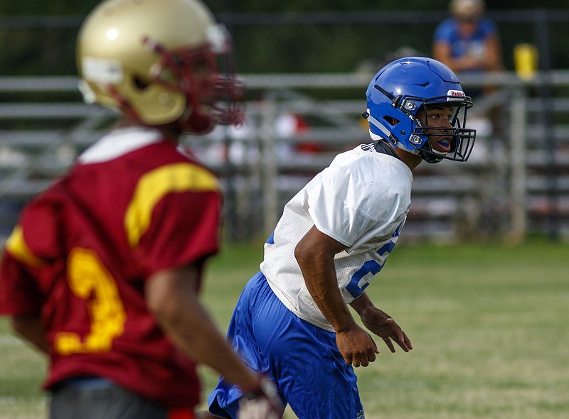 Sale Creek football player Keylon Hickey drops back to cover a receiver during a scrimmage at Grace Academy. Prior to this year, Sale Creek football practiced on a field at North Hamilton Elementary.