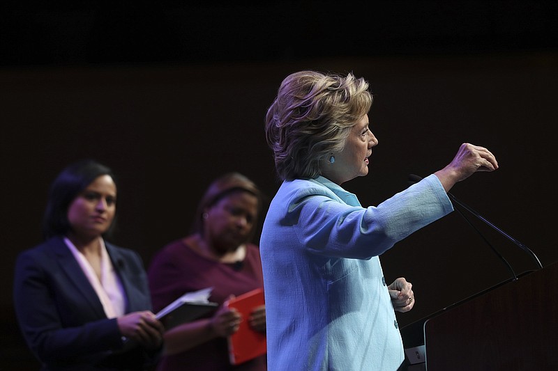 Hillary Clinton, the Democratic presidential nominee, takes questions while speaking at the National Association of Black Journalists and the National Association of Hispanic Journalists joint convention in Washington on Friday. (Stephen Crowley/The New York Times)