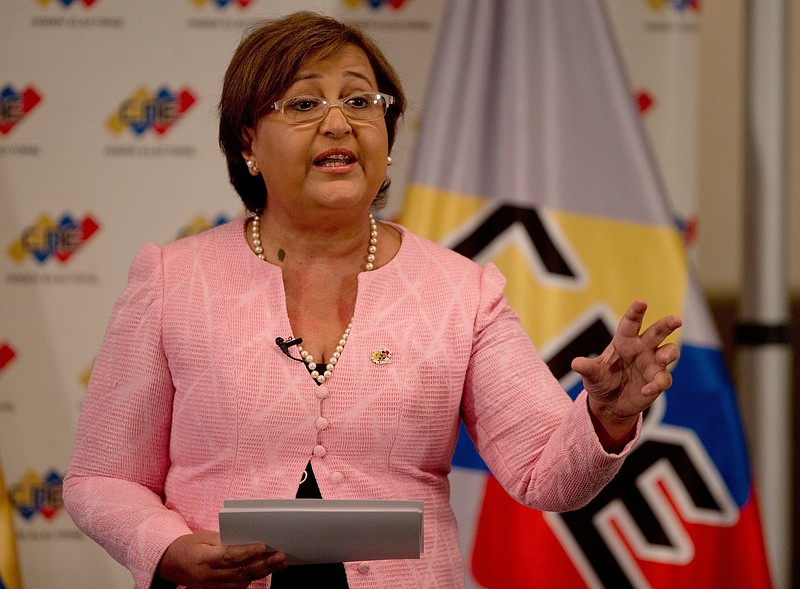 
              National Elections Council President Tibisay Lucena speaks during a televised nation wide speech, from her office in Caracas, Venezuela, Tuesday, Aug. 9, 2016. Venezuelan elections officials have set an October date for a recall drive against President Nicolas Maduro. (AP Photo/Fernando Llano)
            