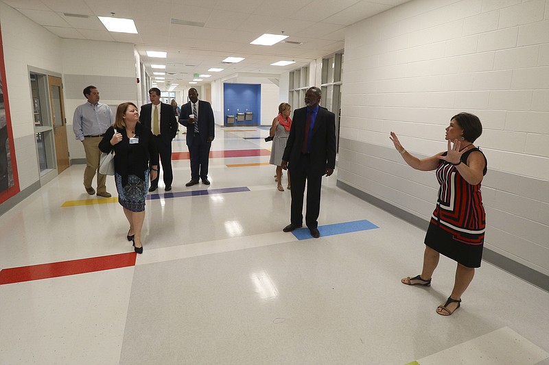 Staff Photo by Dan Henry / The Chattanooga Times Free Press- 8/9/16. Allyson DeYoung, principal of the new Middle Valley Elementary School, leads officials and media on a tour of the new school on Tuesday, August 9, 2016.