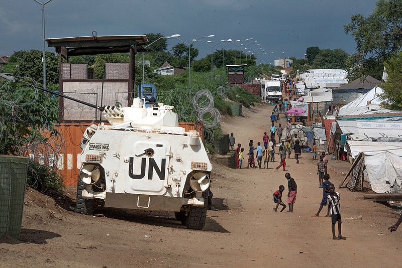 
              FILE---In this file photo taken Monday, July 25, 2016, A UN armoured personnel vehicle stand in a refugee camp in Juba South Sudan. South Sudan on Wednesday, Aug. 10, 2016, rejected a U.S. proposal for the U.N. Security Council to send 4,000 additional troops to the East African country to restore calm, saying it "seriously undermines" its sovereignty and threatens a return to colonialism.  (AP Photo/Jason Patinkin/File)
            