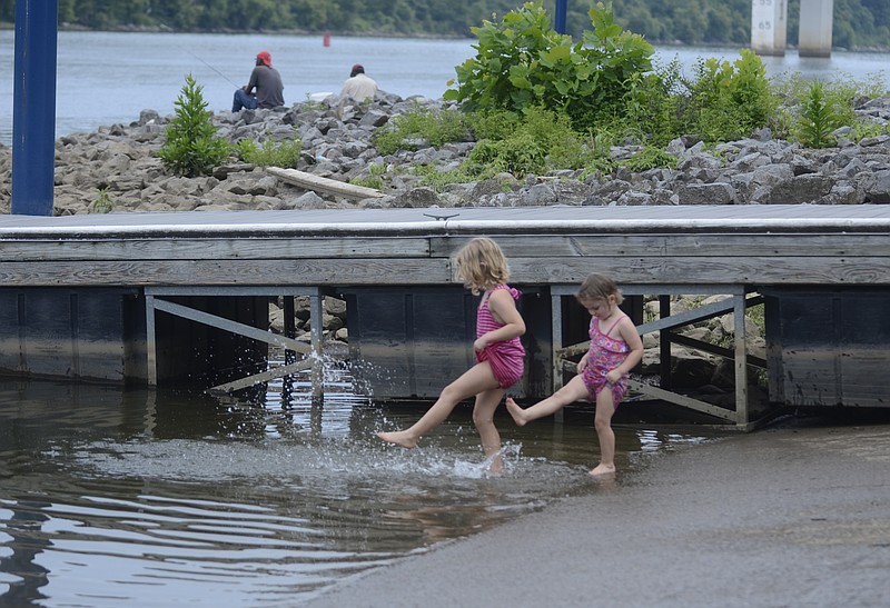 Scenes such as this, where two young children play at the Tennessee Riverpark boat ramp, make the proposal of permitting alcohol at special events in three county parks an idea better left undone.