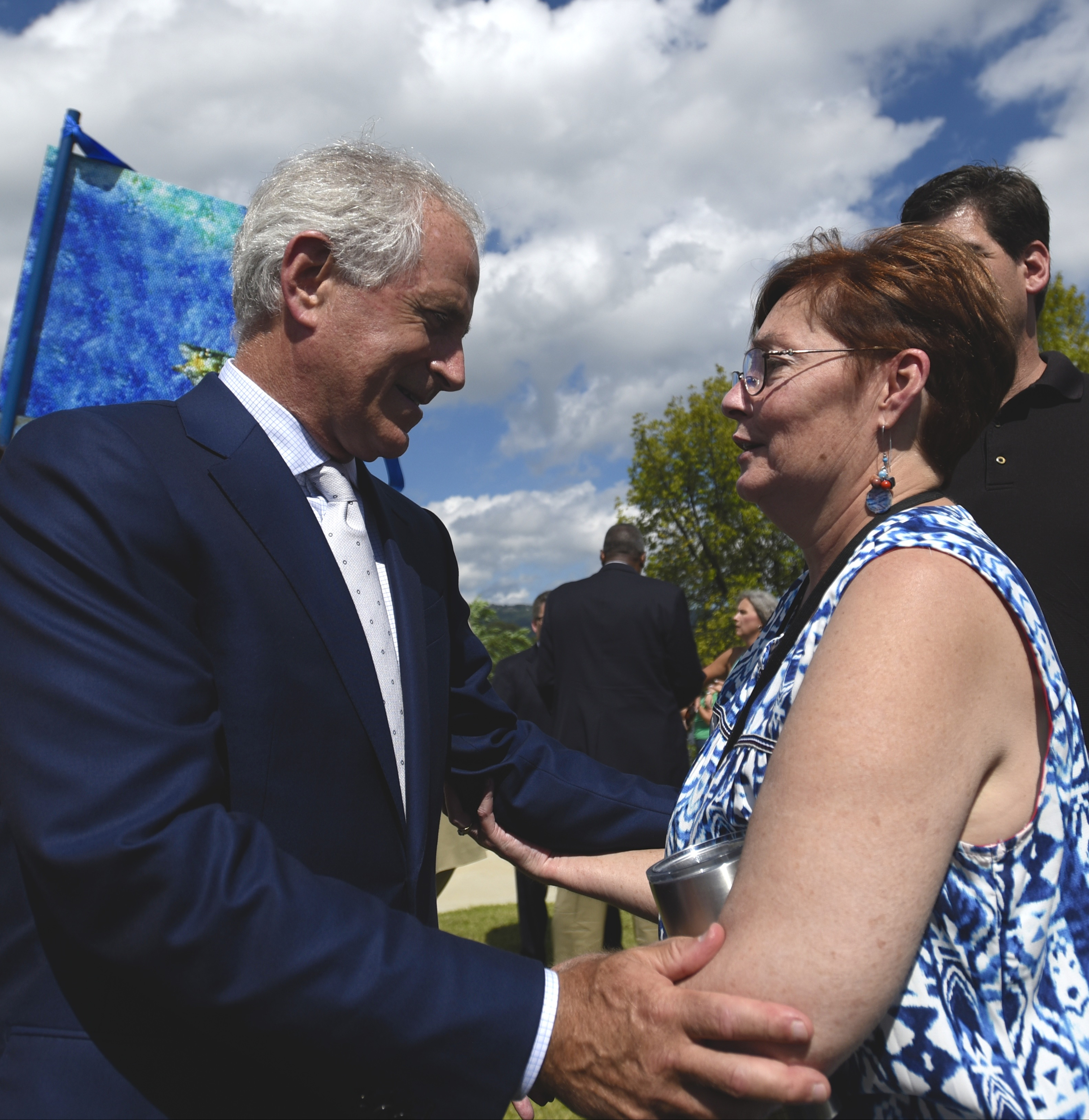 Senator Bob Corker, left, talks with Jackie Thompson after the ribbon cutting for the 3-mile extension of the Riverwalk Friday, August 12, 2016.