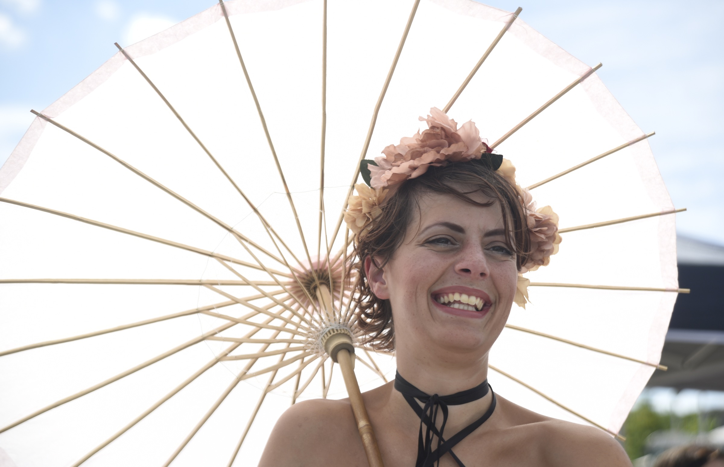 Alicia Pickett, also known as the Southern Belle Riverboat's Charlotte, listens during grand opening of the 3-mile extension of the Riverwalk Friday, August 12, 2016.
