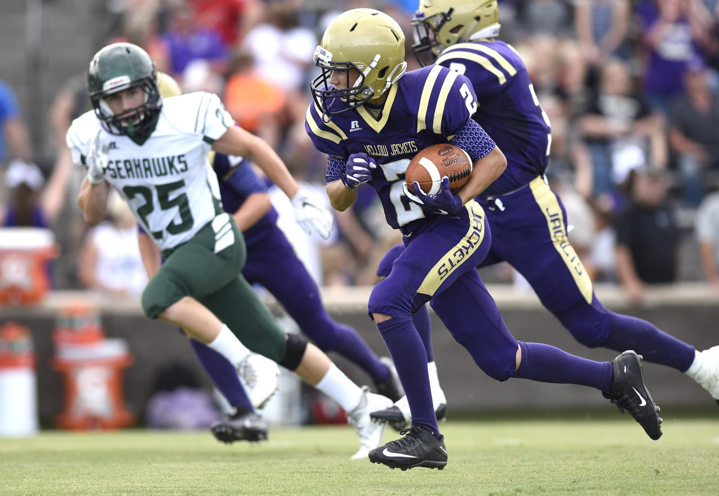 Grundy County's Evan Nunley (2) breaks free for a long gain against Silverdale. The Sequatchie Valley Football Jamboree was held at South Pittsburg High School on Friday August, 12, 2016.