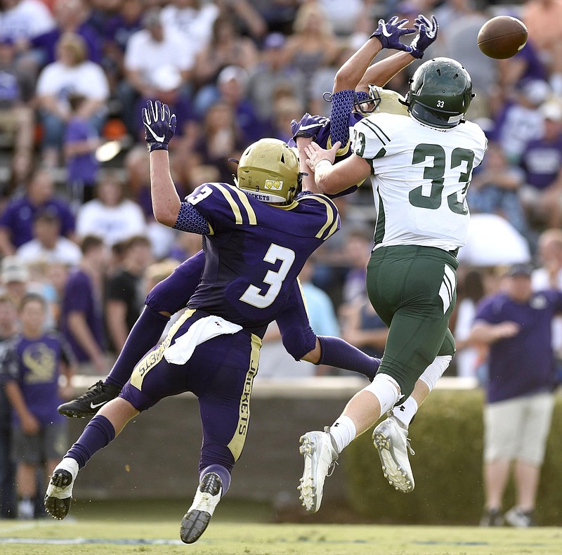 Grundy County's Evan Nunley (2) and Josh Wingo (3) break up a pass intended for Silverdale's Christian Rogers (33).  The Sequatchie Valley Football Jamboree was held at South Pittsburg High School on Friday August, 12, 2016. 