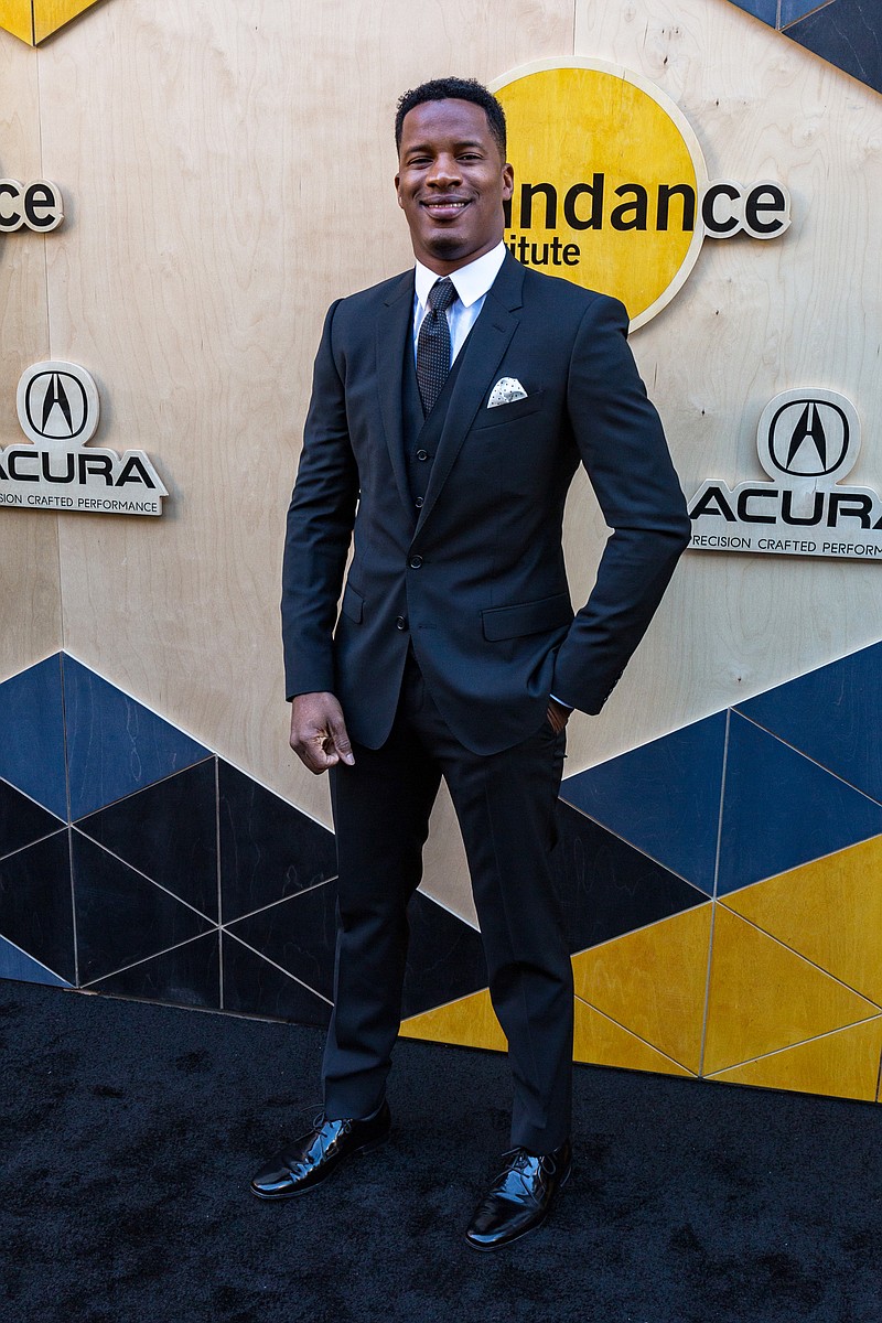 
              Nate Parker arrives at the Sundance NIGHT BEFORE NEXT Benefit at The Theatre at Ace Hotel on Thursday, Aug. 11, 2016, in Los Angeles. (Photo by Willy Sanjuan/Invision/AP)
            