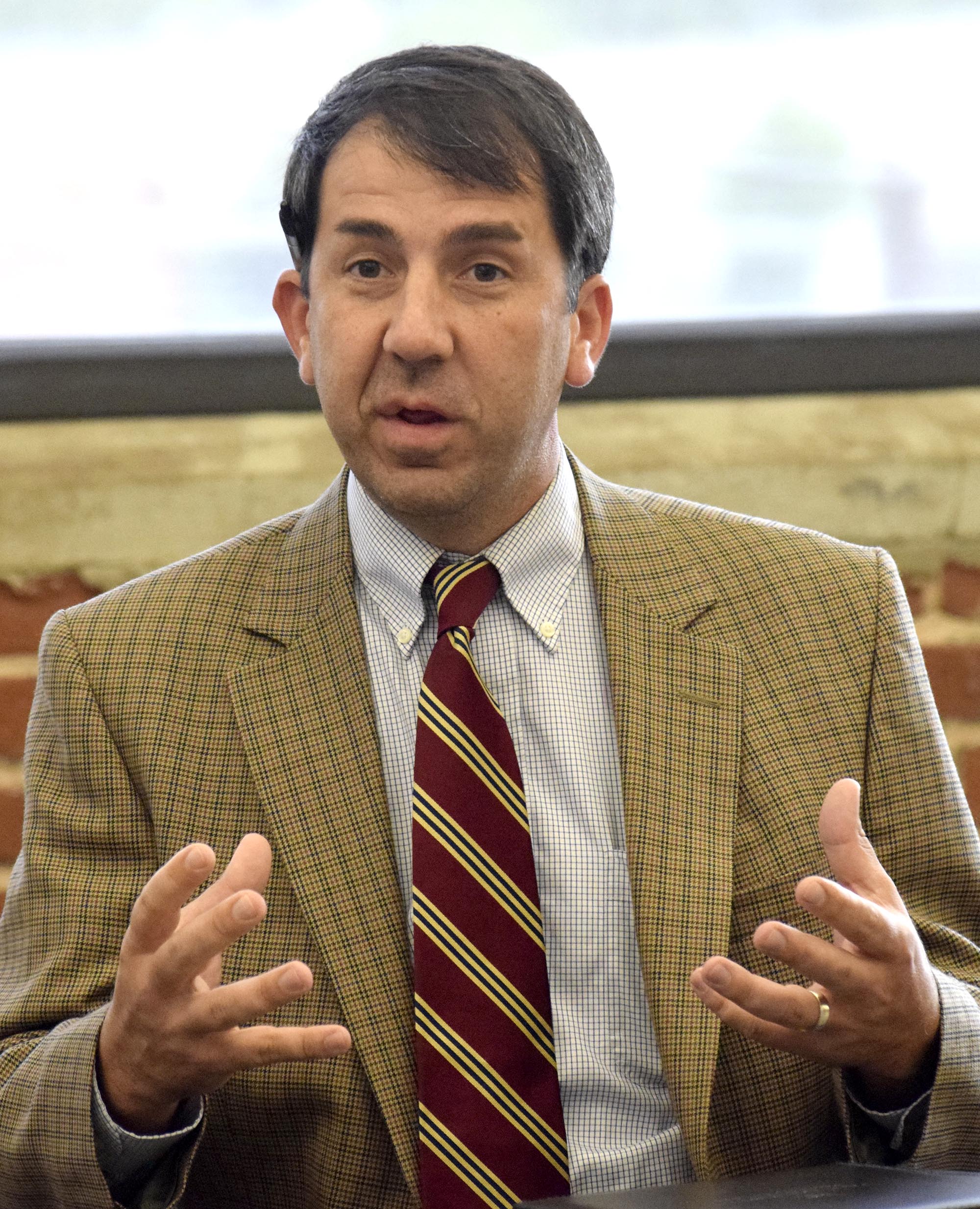Hamilton County Department of Education Assistant Superintendent, Justin Robertson, speaks to reporters. Members of the Hamilton County Department of Education visited the Chattanooga Times Free Press to discuss goals for the 2016 school year.