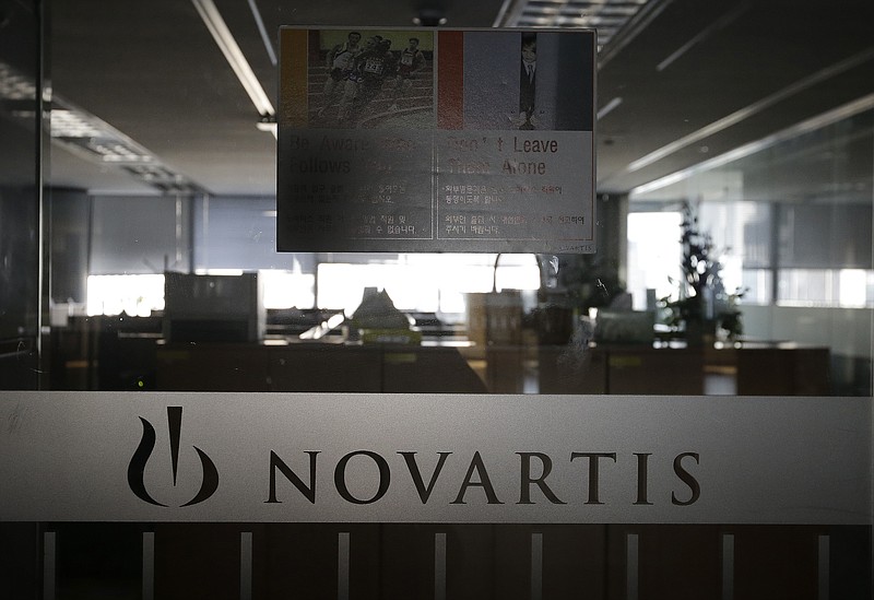 
              A logo of Swiss pharmaceutical company Novartis is seen at the Novartis Korea office in Seoul, South Korea, Saturday, Aug. 13, 2016. Prosecutors indicted the former chief executive of the South Korean unit of Novartis and five other former and current managers over allegations they illegally paid doctors 2.6 billion won ($2.3 million) in return for prescribing the company's drugs. (AP Photo/Ahn Young-joon)
            