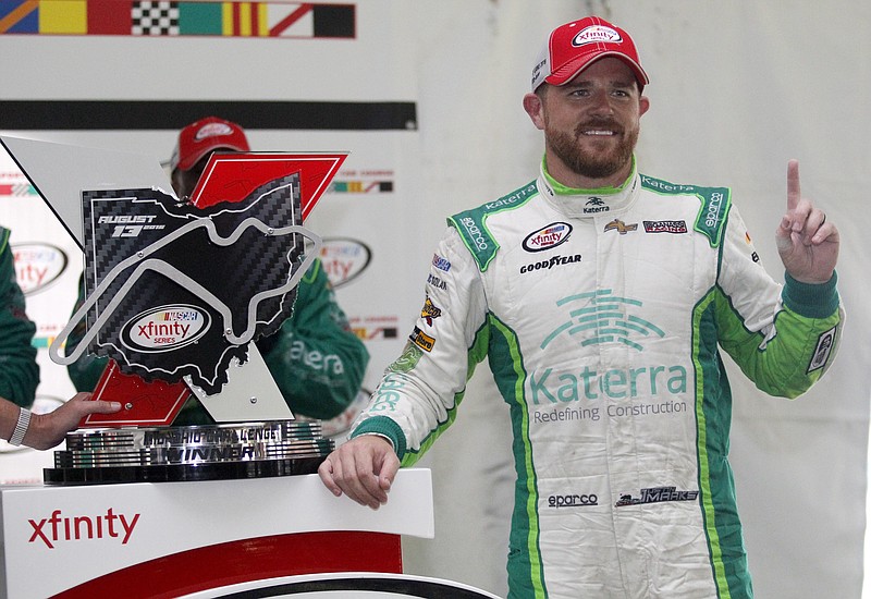 Justin Marks celebrates winning the NASCAR Xfinity Series auto race at Mid-Ohio Sports Car Course Saturday, Aug. 13, 2016, in Lexington, Ohio.