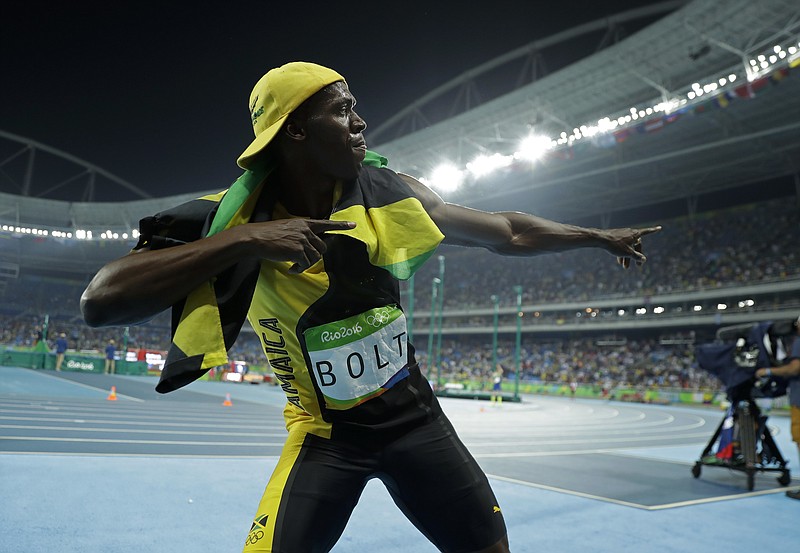 Jamaica's Usain Bolt celebrates after winning the gold in the men's 100-meter final during the athletics competitions in the Olympic stadium of the 2016 Summer Olympics in Rio de Janeiro, Brazil, Sunday, Aug. 14, 2016.