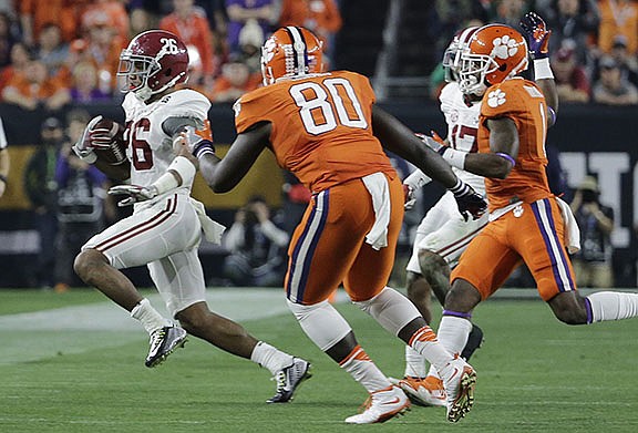 Alabama's Marlon Humphrey catches an onside kick during the second half of the NCAA college football playoff championship game against Clemson Monday, Jan. 11, 2016, in Glendale, Ariz. (AP Photo/David J. Phillip)