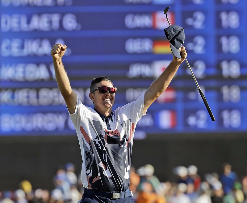 Justin Rose of Great Britain, wins the gold medal during the final round of the men's golf event at the 2016 Summer Olympics in Rio de Janeiro, Brazil, Sunday, Aug. 14, 2016.